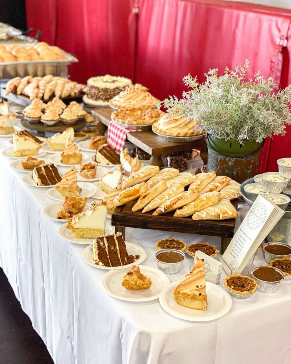 Catering table of various pastries and desserts